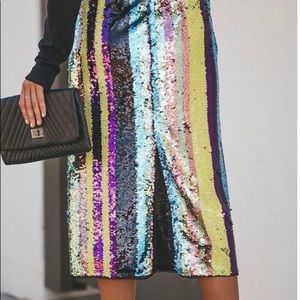 Women’s multi-colored knee length skirt, small slit in back